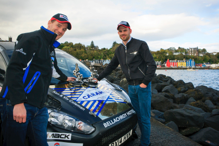 1--John-MacCrone--right--with-co-driver-Stuart-Loudon-after-the-presentation-and-Tobermory-in-background-2-copy.jpg